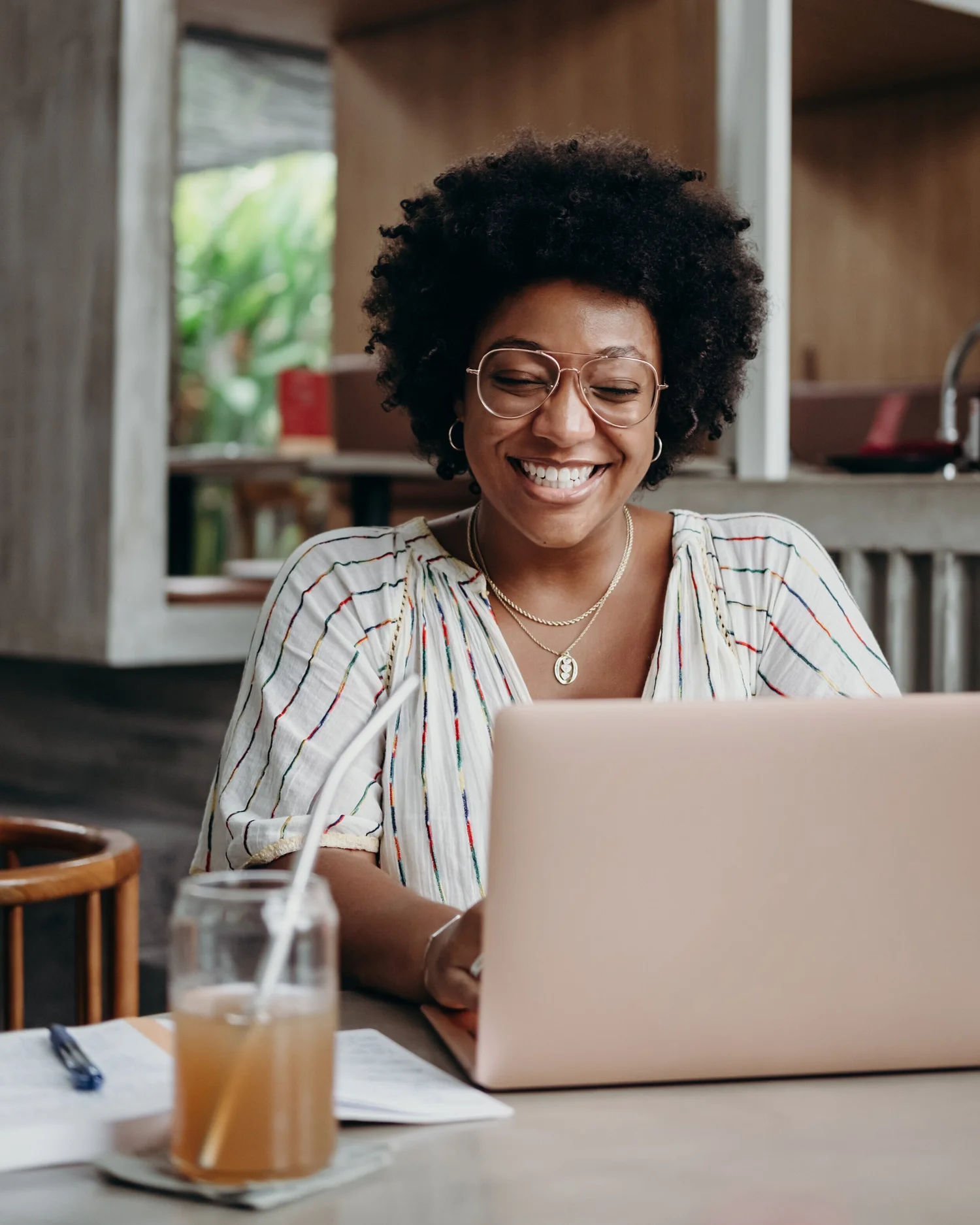 A person working on a laptop at home